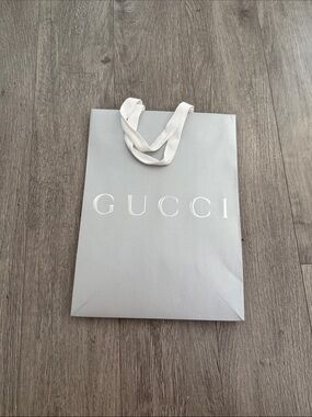 Authentic New Gucci Gray Paper Shopping Bag with White Ribbon Handles